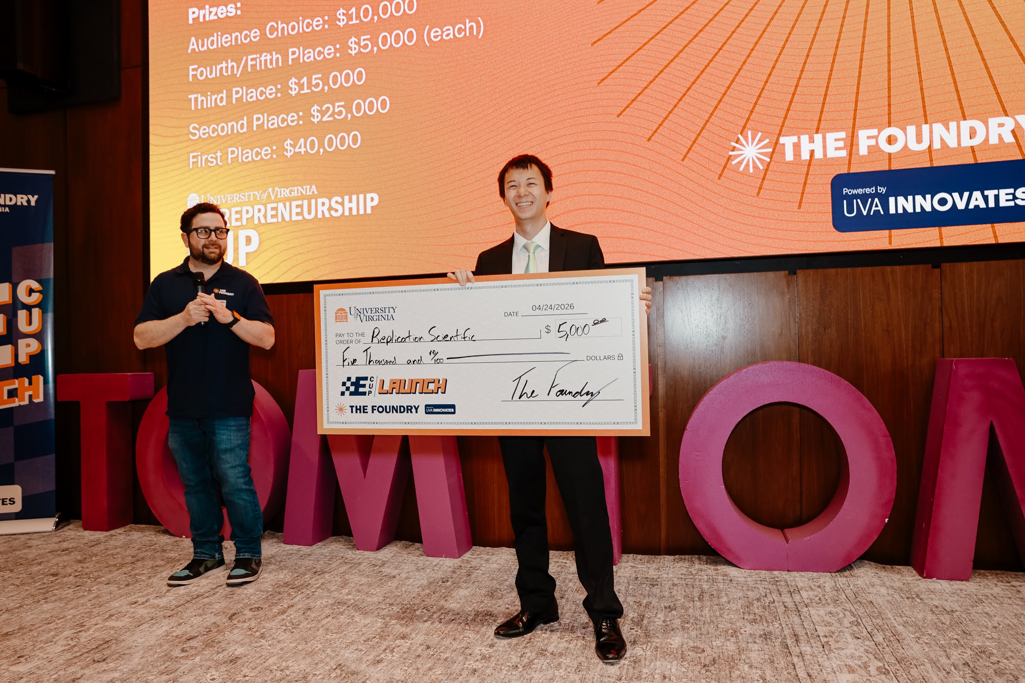 The 2026 winners on stage at the CODE Building